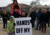A family from Burnsville attended a rally at the State Capitol to oppose upcoming hearings on gun control legislation. Photo by nick coleman