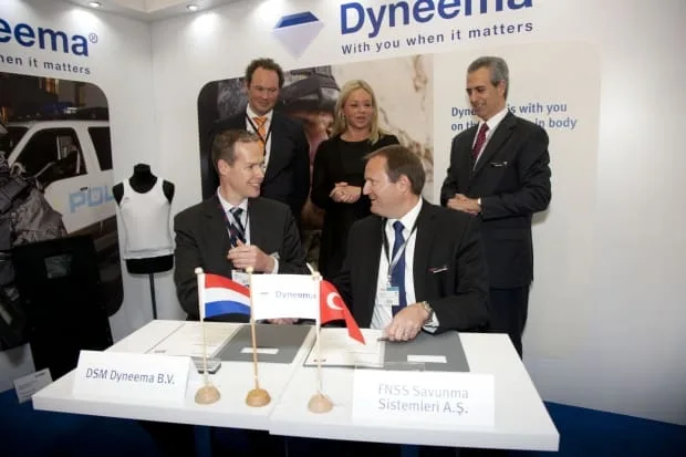 The Letter of Intent was signed by Dirk Louwers, marketing manager Life Protection, EMEA, DSM Dyneema, Bastiaan de Koning, director sales, EMEA, DSM Dyneema, Nail Kurt, general manager and CEO, FNSS, and Reed McPeak, assistant general manager, FNSS. It was signed in the presence of The Netherlands Minister of Defence, Jeanine Hennis-Plasschaert, at the DSM Dyneema booth #284A in Hall 2.