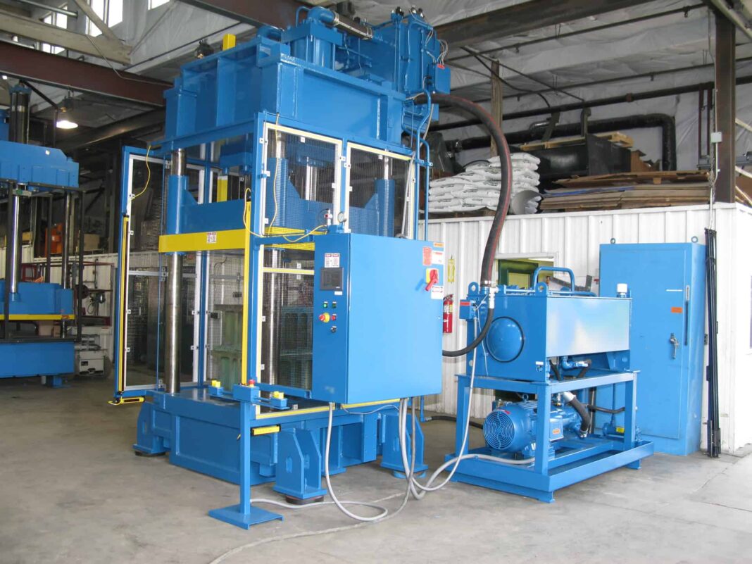 400 ton down-acting 48” x 58” hydraulic press refurbished by Icon for a composite armor manufacturer.