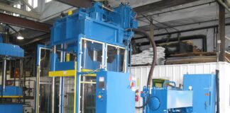 400 ton down-acting 48” x 58” hydraulic press refurbished by Icon for a composite armor manufacturer.