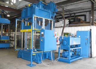 400 ton down-acting 48” x 58” hydraulic press refurbished by Icon for a composite armor manufacturer.
