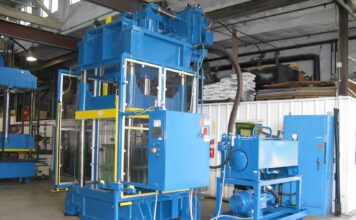 400 ton down-acting 48” x 58” hydraulic press refurbished by Icon for a composite armor manufacturer.