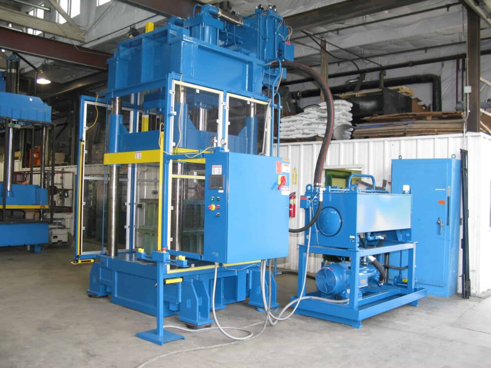 400 ton down-acting 48” x 58” hydraulic press refurbished by Icon for a composite armor manufacturer.