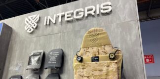Integris Composites' hard ballistic plates and plate carrier at their booth at Milipol Paris 2023