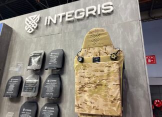 Integris Composites' hard ballistic plates and plate carrier at their booth at Milipol Paris 2023