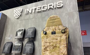 Integris Composites' hard ballistic plates and plate carrier at their booth at Milipol Paris 2023
