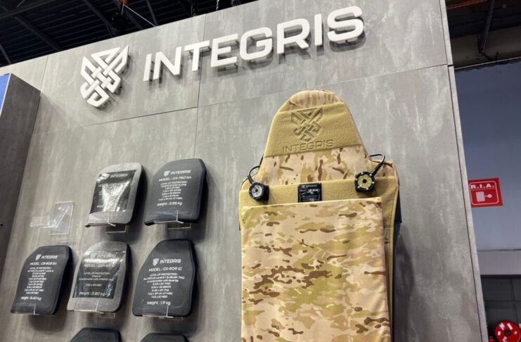 Integris Composites' hard ballistic plates and plate carrier at their booth at Milipol Paris 2023
