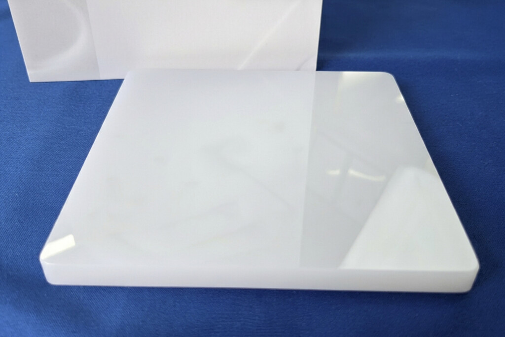 A translucent and mirror-polished ultra-high-purity alumina tile from Nishimura Advanced Ceramics